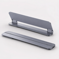 Space Grey fold-out laptop stand shown folded flat and opened in a clean product hero image